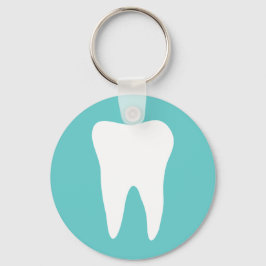 Nyckelkedja tandvård med vit tandtand-logotyp nyckelring