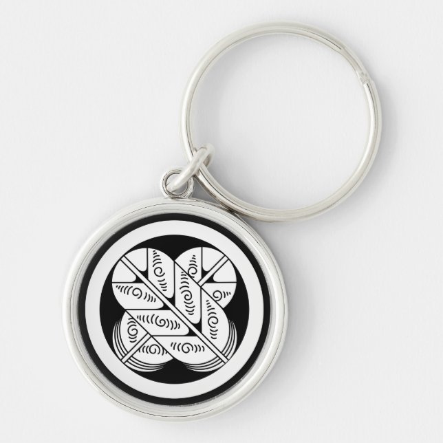 Nyckelkedjan Geishu Hawk-fjädrar Rund Silverfärgad Nyckelring (Framsidan)