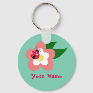 Nyckelpiga på blommakeychain nyckelring
