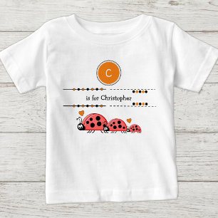 Nyckelpigor lägg till namn svart och orange t shirt