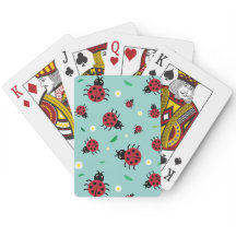 Nyckelpigor som leker kort