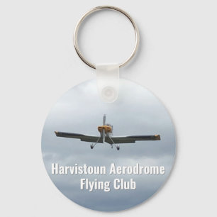 Nyckelring av flygande Klubb med lätta flygplan.