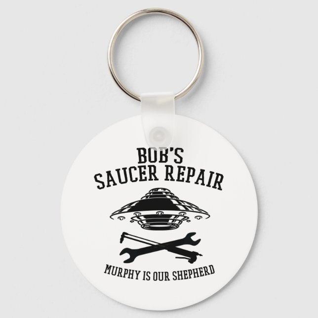 nyckelring med svart Bob's Saucer Repair-logotyp  (Framsida)