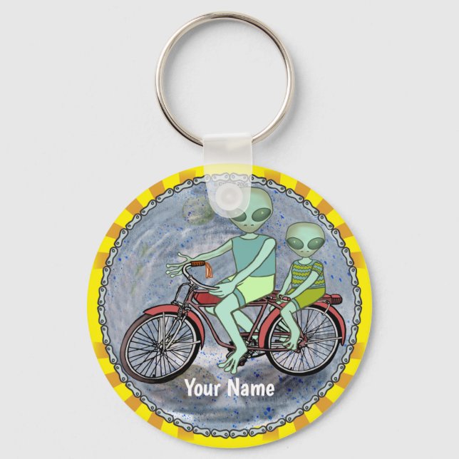 Nyckelring med utomjording på cykel (Framsida)