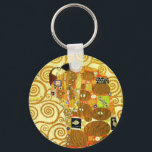 Nyckelringen Gustav Klimt Fulfillment Nyckelring<br><div class="desc">Gustav Klimt Fulfillment nyckelring. Frys från 1909. Fyllningen slutfördes under Klimts gyllene fas och fyller ett omfångsrikt par som håller varandra under en flermönstrad film med spiral, öga, fåglar, fisk och andra former. Bakgrunden till arbetet är samma brons spiral som skulle beröva konstnärens berömda Livets träd. En underbar gåva till...</div>