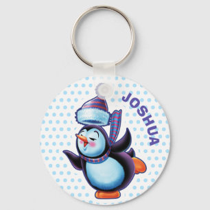 Nyckelringjul som åker skridskor penguin.en nyckelring
