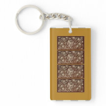 Nyckelringsbricka med designform från Papua Nya Gu