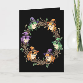 Nyckfull kransgräns prydd med häxiga paddor helgkort