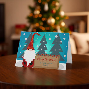 Nyckfull röd tomte snöig vinter skog jul kort