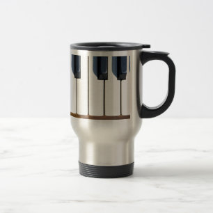 Nycklar på ett piano resemugg