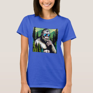Nyfiken Bigfoot med solglasögon som gömmer sig i s T Shirt