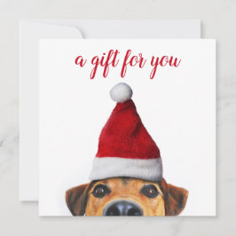 Nyfiken Rolig hund för sljud med julklapp