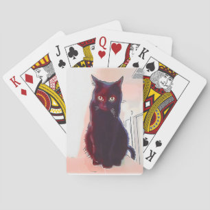 Nyfiken svart katt som leker kort spel kort