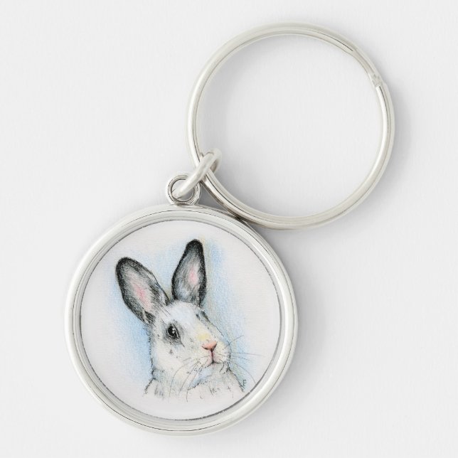 Nyfiket Rund Silverfärgad Nyckelring (Framsidan)