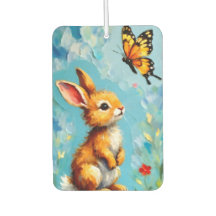 Nyfikna kanin och fjäril