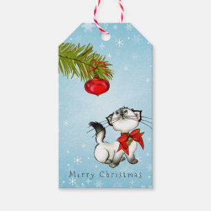 Nyfikna Kattunge i en röd julklapp Presentetikett
