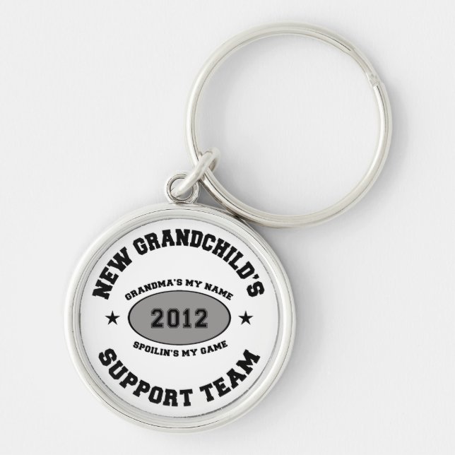 Nytt barnbarn 2012 rund silverfärgad nyckelring (Framsidan)