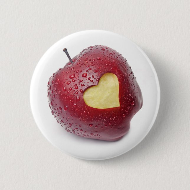 Nytt rött äpple med ett hjärtformade symbol knapp (Framsida)