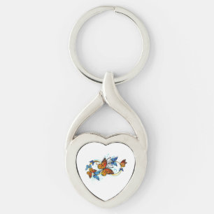 Oändlighet av monarkfjärilar twisted heart silverfärgad nyckelring