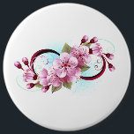 Oändlighet med Blommar Flowers Sakura Knapp<br><div class="desc">Symbol för oändlighet med blommor och löv av blåsande sakura-blommar mot ljusbakgrund,  målade med blå färg. Oändlighetssymbolen. Sakura-blommar. Tatto stil. Hanami</div>