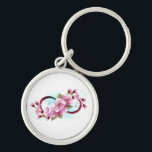 Oändlighet med Blommar Flowers Sakura Rund Silverfärgad Nyckelring<br><div class="desc">Symbol för oändlighet med blommor och löv av blåsande sakura-blommar mot ljusbakgrund,  målade med blå färg. Oändlighetssymbolen. Sakura-blommar. Tatto stil. Hanami</div>