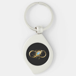 Oändlighet med Golden Peacock Feather Swirl Silverfärgad Nyckelring