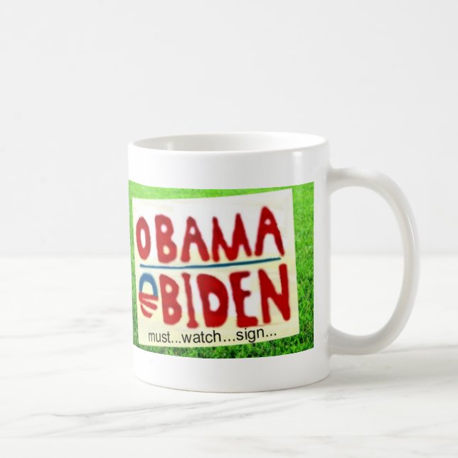 Obama undertecknar klockan kaffemugg (Höger)
