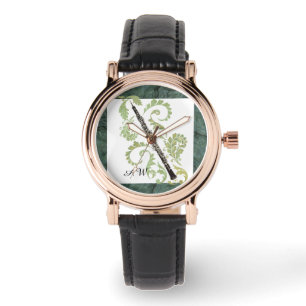 Oboe och lövverkstenen verkställer den armbandsur