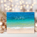 Ocean Beach Wish You God jul Helg Vykort<br><div class="desc">Julvykort med hav och strand. Anpassa till hälsning och namnteckning. Tropiskt blå vatten och strandsand på framsidan med exempeltexten "vi önskar dig" (ändra ordalydelsen till "I" efter behov). Ordalydelsen fortsätter på baksidan med "God jul" och "Gott nytt år" hälsning.</div>