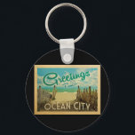 Ocean City Beach Vintage resor Nyckelring<br><div class="desc">I Hälsning från Ocean City vintage finns en sandstrand med vackra turkoshavet vatten och över havet,  ett blå himmel med gigantiska vita moln. I vintage resor stil.</div>