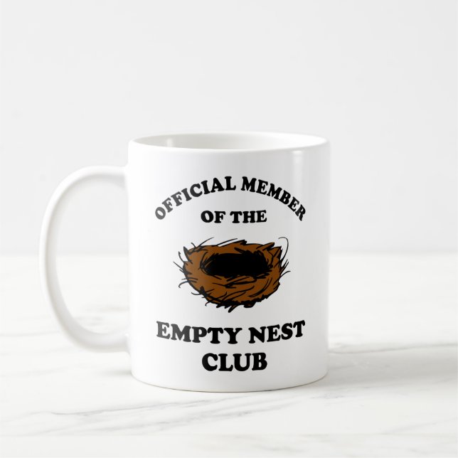 Officiell medlem i den tomma kapslade Klubben Kaffemugg (Vänster)