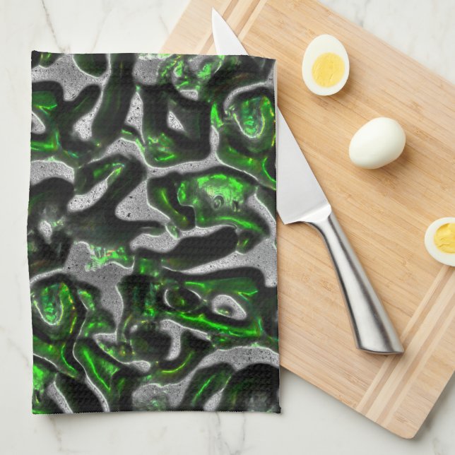 Öga som fångar kalkgrönt struktur som bärs i grått kökshandduk (Vikt i Fjärdedel)