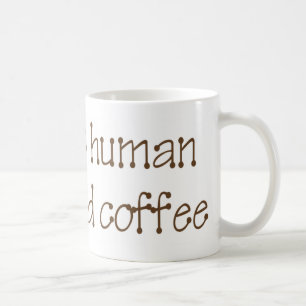 Ögonblickmänniskan tillfogar precis kaffemuggen kaffemugg