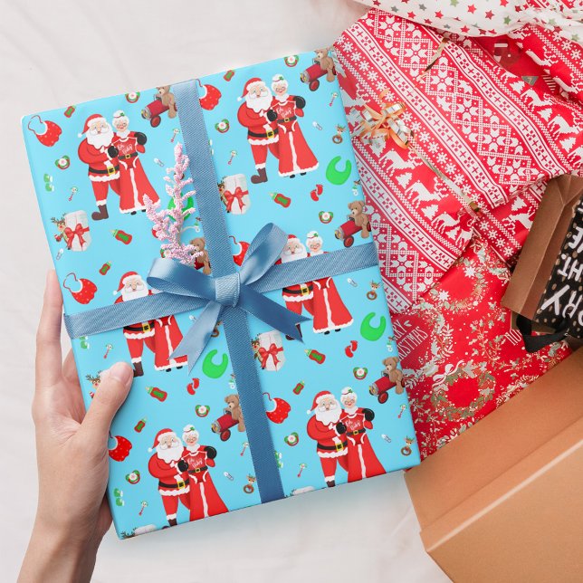 Oh Baby Santa & Mrs Claus Baby Shower Blue Presentpapper (
Embrace holiday magic with Santa & Mrs. Claus Baby Shower Wrapping Paper. )