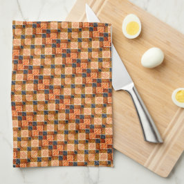 Ojämnt orange schackdelar som bildar nya kvadratis kökshandduk