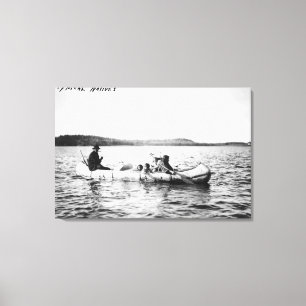 Ojibwaindier som korsar sjön i kanot, fotografera canvastryck