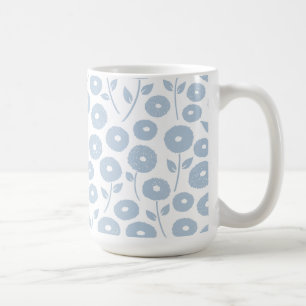 Oklart blommönster blått på vitt kaffemugg