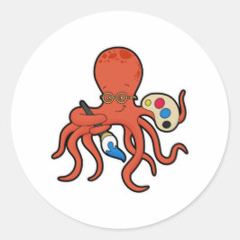 Oktopus som målarfärg med färg och pensel runt klistermärke