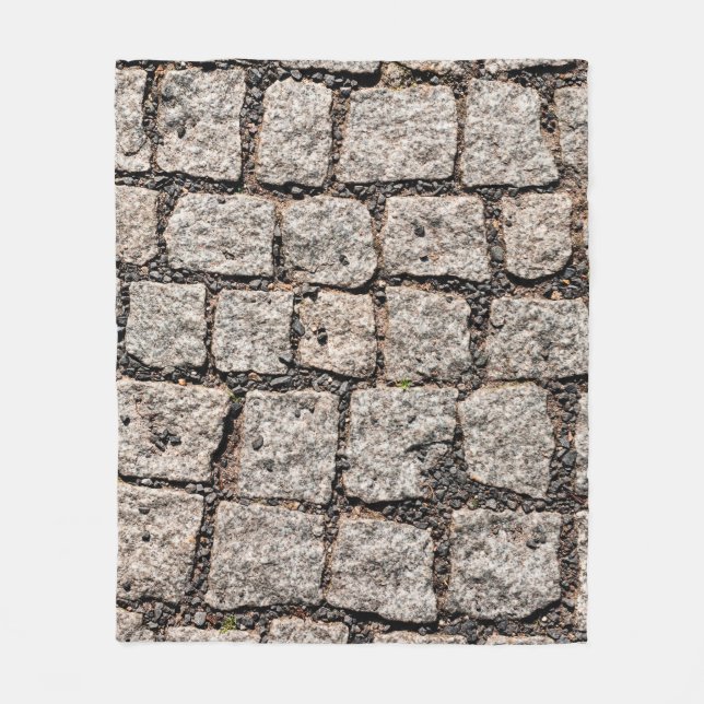 Old cobble stone pattern at the streetabstract,anc fleecefilt (Framsidan)