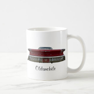 Oldsmobile 1960 beklär och drar tillbaka muggen kaffemugg