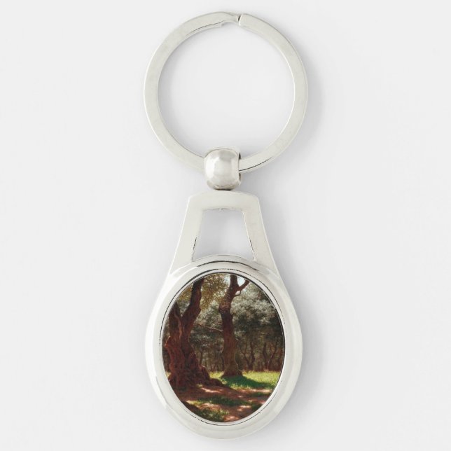 Olivskog i Cap Saint Martin Ovalt Silverfärgad Nyckelring (Framsidan)