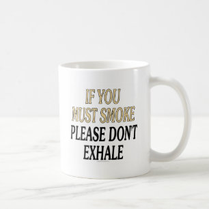 Om du måste röka, behaga utandas inte kaffemugg