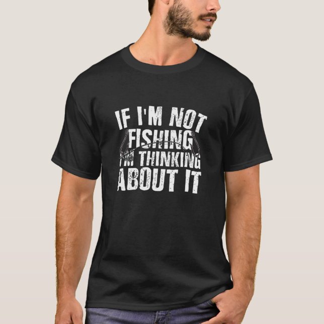 Om han inte fiskar tänker han på det t shirt (Framsida)