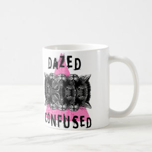 OMTUMLAT OCH FÖRVIRRAT KAFFEMUGG
