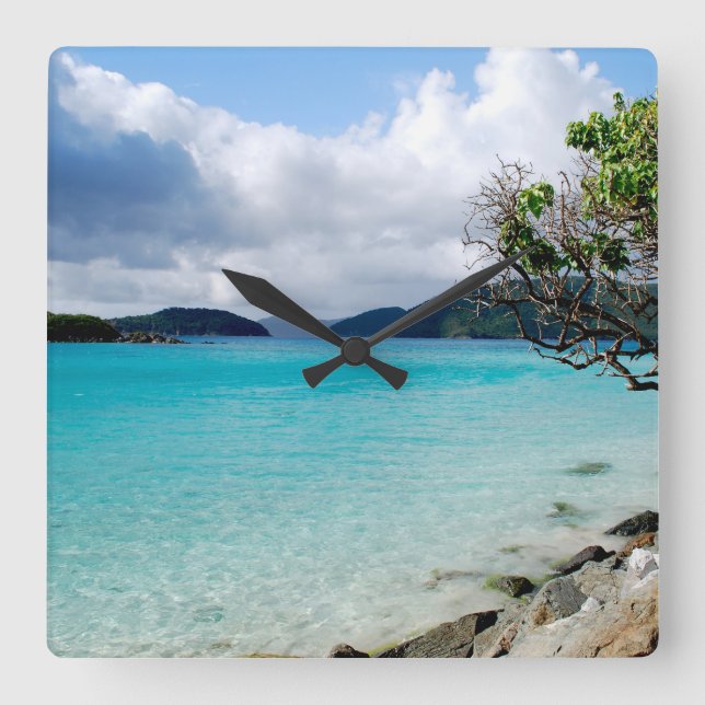 Ön Time, den stora väggen tar tid på Fyrkantig Klocka (Framsida)