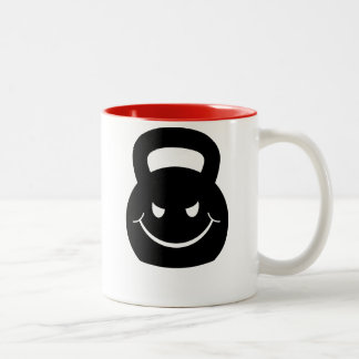 ONDSKA SOM SMILAR KETTLEBELL Två-Tonad MUGG