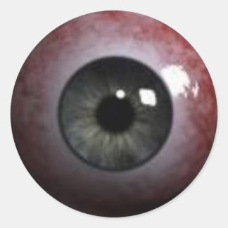 ondskefull ögonboll runt klistermärke