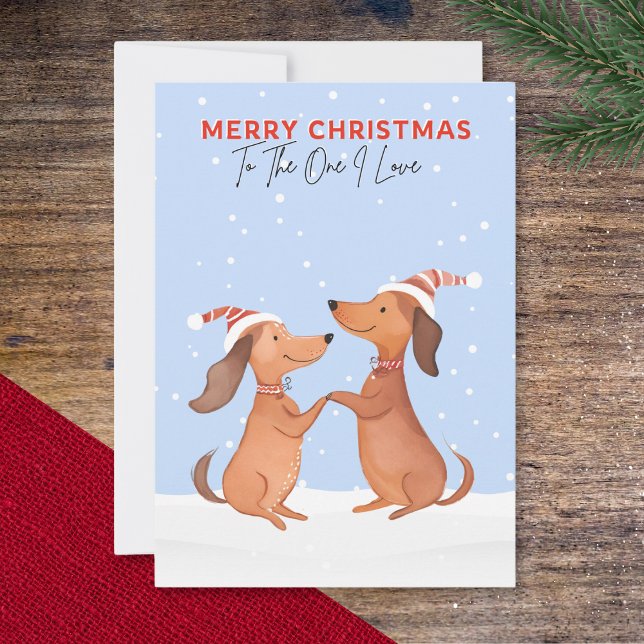 One I Kärlek God jul Dachshunds Sause Hundar Julkort (A Christmas card with two cartoon dachshunds in the snow, 'Merry Christmas' and 'To The One I Love')