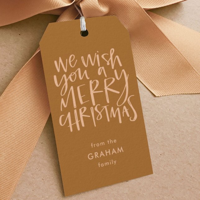 "Önskar dig en God jul" Golden Brown Presentetikett (We Wish You A Merry Christmas hand lettered carol golden brown holiday gift tag.)