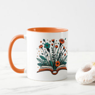 Öppen bok med spirande blommor mugg